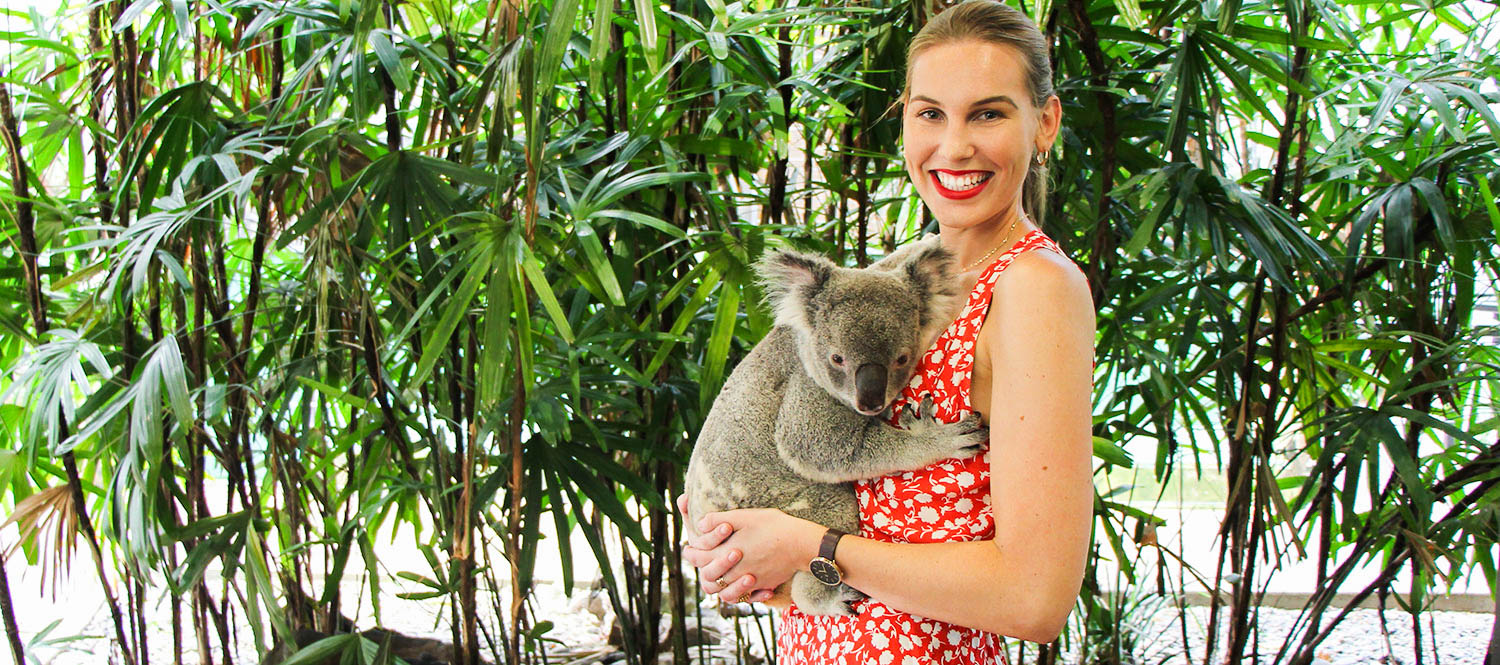 girl-holding-koala-at-wildlife-habitat-port-douglas-1